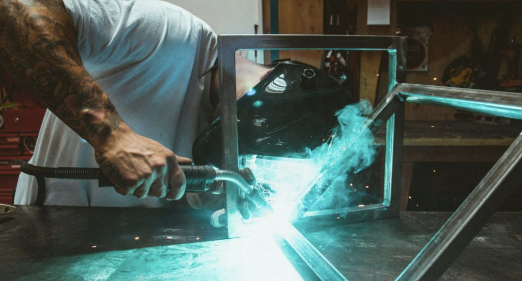 Close up shot of welding an aluminium joint showing how to Weld and Machine 6052 T6 Aluminium. Photo credit Dane Deaner